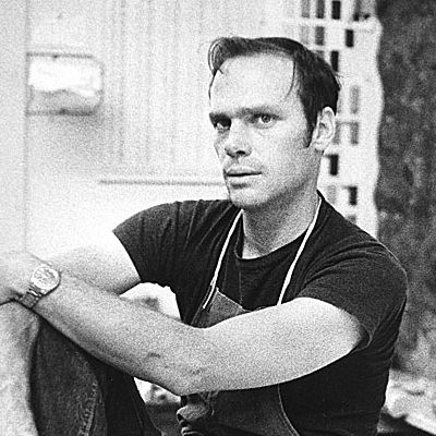 Black and White image of Michael Heizer in his studio