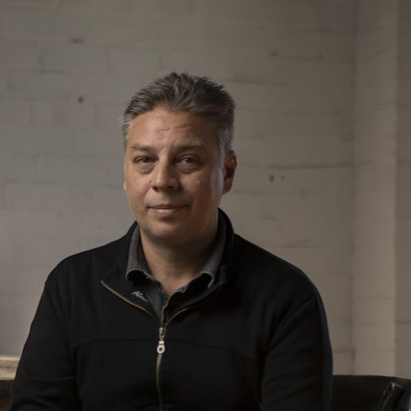 Portrait of a male sitting in a chair
