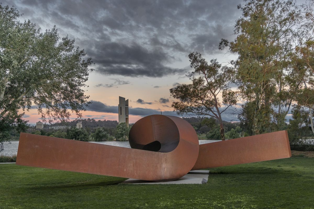 Photograph of sculpture garden with Virginia by Clement Meadmore in foreground and lake in background