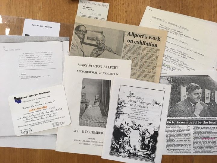 Photograph of ephemera spread on desk