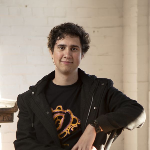 Portrait of a male sitting in a chair
